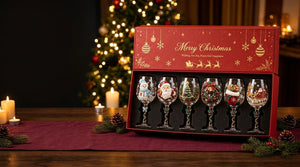 The Christmas Glass Set — six 3D relief goblets in the red gift box